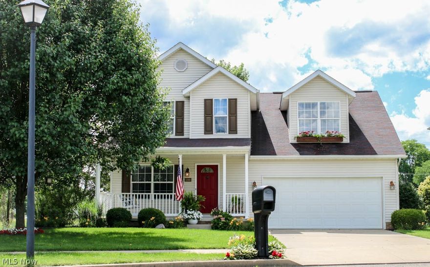 Beautiful 4 bedroom, 2.5 bath colonial with a finished lower level! Open floor plan with a fireplace in the great room. Updated kitchen comes fully applianced, has recessed lighting and wonderful cabinet space! It opens to the dining room with deck access. Convenient, updated half bath on the main level, too. Upstairs, the spacious master suite offers two walk-in closets, a dressing area and a private full bath. So much room! Bedroom 4 has a walk-in closet. Fantastic closet space throughout. This wonderful home even has second floor laundry – no more hauling loads of clothes up and down stairs! On the lower level, the roomy rec room could be used as an additional bedroom, office or play room. Plus there’s ample storage! The oversized garage is deep enough for 3 cars to fit tandem or use that space for all your lawn toys. Entertain in the nicely landscaped backyard with mature trees, a fire pit, paver patio and 15x10 deck. Lovely covered front porch with a swing surrounded by gorgeous f