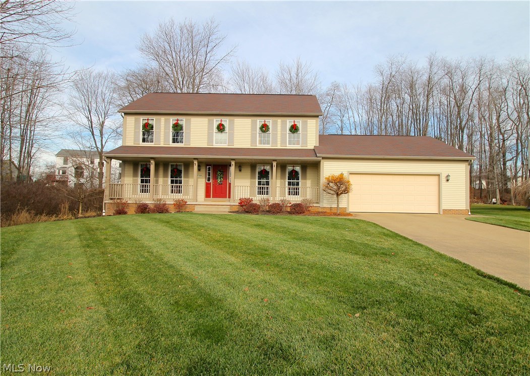 Beautiful three bedroom, 2.5 bath Colonial on Cul-de-sac! This one owner home has been very well cared for from the lush landscaping to the tasteful decorating on the inside. The first floor offers an open floor concept with the kitchen and family room open to each other, which is great for entertaining. The kitchen offers plenty of storage and cooking prep space for all your cooking needs and has a new garbage disposal and dishwasher. Access the large back deck from the door off the kitchen eating area and enjoy all the lovely outside views, complete with an awning which was installed in 2013 so you can enjoy in the shade. Relax in the family room next to the cozy stone gas fireplace while entertaining or enjoying your favorite moving and cup of hot coffee or hot chocolate. You will also find the laundry room on the main floor as well for easy access. The second floor offers a gorgeous vaulted master suite with huge walk in closet and ensuite bath. There are 2 additional bedrooms