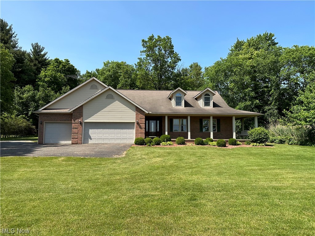 Stunning rural property that offers a unique opportunity to experience peaceful country living at its finest, but minutes from Wooster's North end. This beautiful 3-bedroom, 2.5-bathroom ranch-style home is situated on over 2.5 acres of land and features a spacious open floor plan. As you enter the home, you are greeted by a light-filled living room with vaulted ceilings and a cozy fireplace, creating a warm and inviting atmosphere. The kitchen boasts ample cabinet space, and counter tops making meal preparation a breeze. The adjacent dining area offers plenty of space for your family to gather and enjoy meals together. The master bedroom is a retreat in itself, with a luxurious en-suite bathroom featuring a soaking tub and separate shower. Two additional bedrooms and a full bathroom offer plenty of space for guests or a growing family. Other features you will appreciate are the central vacuum system, and a 14 course basement that offers the opportunity to add more finished space! Outs