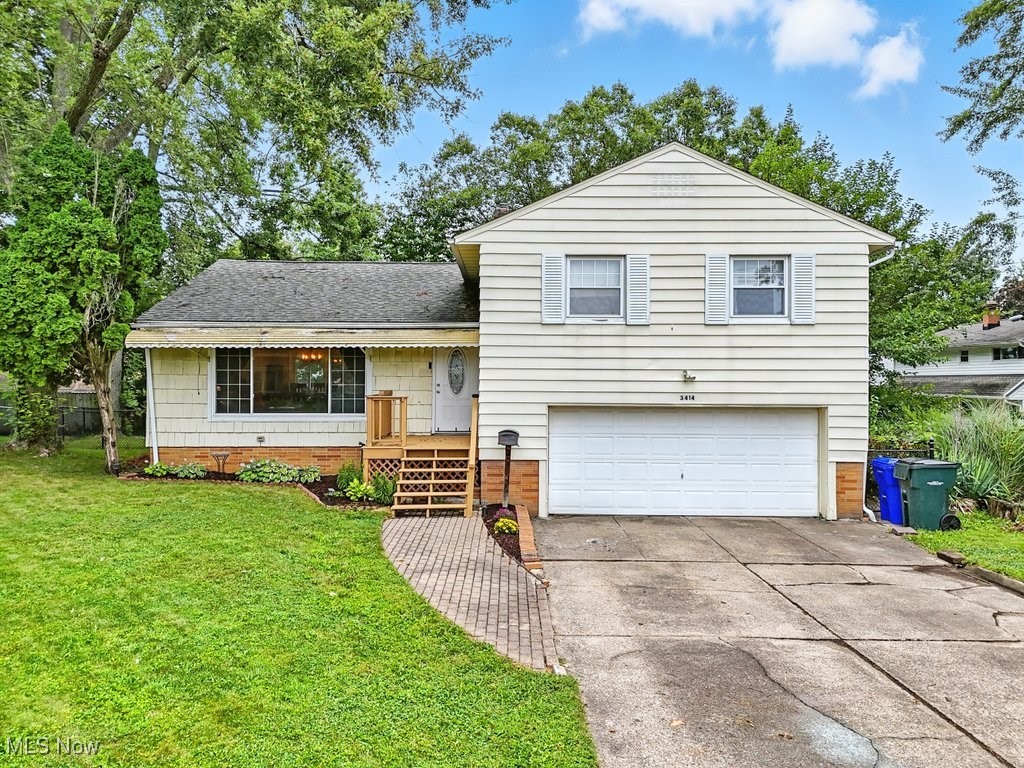 Welcome to this charming split-level home tucked away on a quiet cul-de-sac in a desirable Cuyahoga Manor development. This 3-bedroom, 2.5 bath home offers a comfortable layout with plenty of space to enjoy. The main level features a bright living area that flows into the kitchen and dining space, while the upstairs hosts three bedrooms, a full bath, and a master suite with its own full bath. The lower level offers a cozy family room with walk-out access to the fully fenced backyard, perfect for entertaining or relaxing. As a bonus, the neighborhood includes an optional community facility at the end of the street with a pool, pavilion, and basketball courts, which will transfer to the new owner. Conveniently located just minutes from shopping, dining, and highway access, this home blends quiet neighborhood living with everyday convenience.