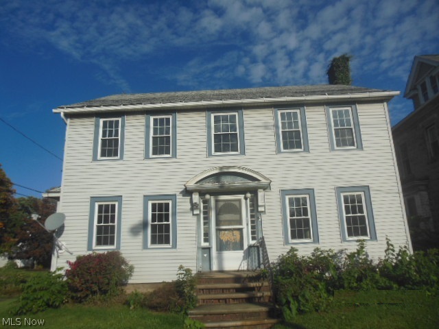 Auction terms apply. Live large in this stately 2 story colonial on the outskirts of Lake Erie. Quite charming, this hardwooded floored home with large room sizes is just want the Buyer needs for oversized furnishings. High ceilings, arched and french doorways, formal dining room, lots of light in living room, full basement with plenty of storage. Kitchen has eat-in dining area with lots of cabinet and countertop space to express your culinary talents. Windows have lots of character and fireplace adds to ambiance in this home. Large backyard with double garage and workshop/out bldg. Perfect home for the preservation/restoration lover in all of us. See Broker Remarks for details on auction.