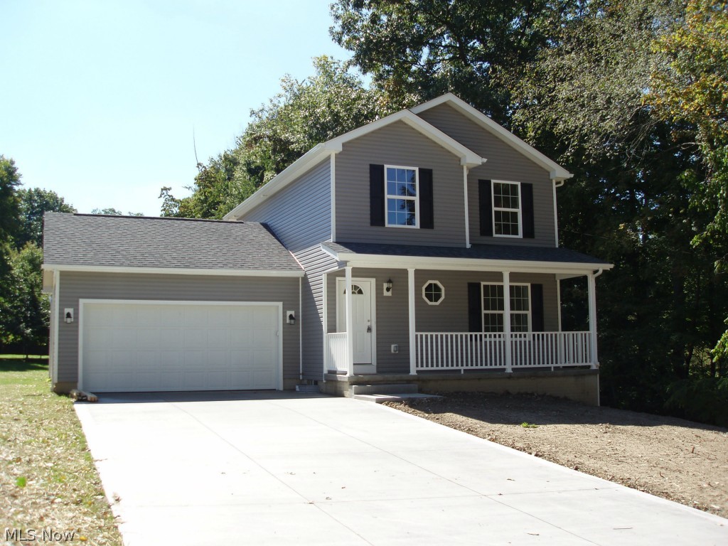 New Construction!!! Don't Miss Out!!! 3 sold 1 still available. Hurry and move into this Brand New energy efficient Home. 2"x6" exterior construction for extra strength and insulation. Overlooking a deep yard with a view of the golf course. This quality home has an open floor plan which is great for family and entertainment. The First floor features a spacious living room and a kitchen with beautiful Maple Cabinets, pantry, dishwasher,microwave and a disposal.
Sliding door that leads out to a deck with a view of the golf course. The first floor also has a half bath.
The Second floor has 3 Bedrooms and 2 full baths. The large Master bedroom includes a large walk-in closet and a full bath. The basement has a poured foundation with high ceiling for future Family Room. Spacious 2 car attached garage, Front Porch, concrete drive, an energy efficient furnace, Central Air,
energy efficient windows, and a 50 gallon hot water tank. Call now for your private showing. ( taxes have not been