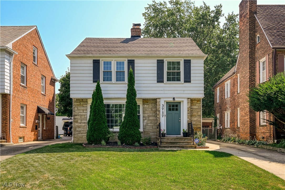 Welcome to this charming Colonial in Shaker Heights! Discover timeless charm and modern updates in this delightful 3-bedroom, 2.5-bath home perfectly situated within minutes of Van Aken Boulevard, shopping, dining, the Van Aken District, Thornton Park, and the Lynnfield train station. Step inside to find a bright and spacious living room, which features a woodburning fireplace and flows seamlessly into the formal dining room. The beautifully updated kitchen is a dream, featuring granite countertops, stainless steel appliances, and space for casual dining. An adorable half bath with a corner sink and an office/flex space finishes off the first floor. On the second floor, find 3 bedrooms and a full remodeled bathroom. The primary bedroom features two closets, including a walk-in, offering direct access to a charming second-story balcony, the perfect spot to unwind with a book or savor your morning coffee. Beautiful hardwood floors run throughout the home, adding warmth and classic style. An additional full bathroom and large recreation room offer even more space and convenience in the lower level. Outside, enjoy the private backyard, ideal for summer barbecues or quiet evenings under the stars. This home also offers numerous updates, including garage doors (2024), backdoor composite decking and steps (2024), balcony railing (2025), front stoop railing (2024), flooring in the bonus room (2025), HWT (2021), A/C and furnace (2022), and fresh paint (2025). The home is warm, inviting, and ready for its next owners. Don't miss this fantastic opportunity!