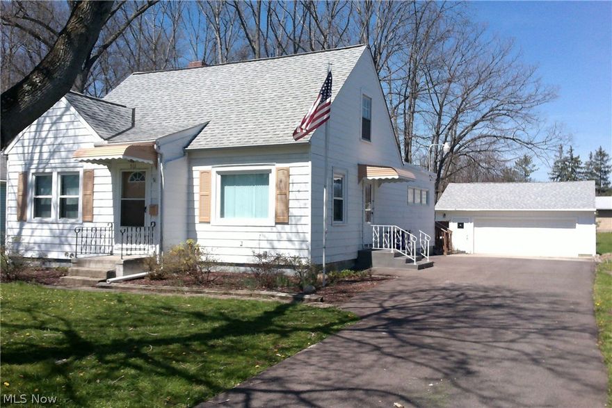 Lots of possibilities with this lovely cape cod. Beautiful hardwood floors in some of the rooms. Easy access to downtown and major highways. Scenic backyard with large deck. Great 2 1/2 bay garage with garage door opener. One of the bedrooms has been converted to a laundry room on the main floor. Laundry may be moved to basement. Upstairs is divided into 2 rooms, may be used as a bedroom and bonus living space.