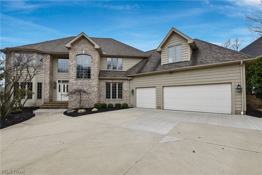 Stunning custom-built colonial!!! Extensive qualities & updates w/breathtaking views of a spectacular resorts-like lot!!! One owner home. A true pride of ownership! Luxurious cathedral ceiling 600 sqft newer 3 season sunroom. Newer extensive custom landscaping w/fire pit & waterfall. Large custom deck & patio w/gorgeous views of wooded/scenic lot!!! Two-story foyer w/custom staircase. Formal living room and beautiful dining room w/hardwood floors & crown molding. Fantastic first floor library/office w/built-in cabinets. Gourmet kitchen w/newer granite countertops, flooring and stainless appliances. Luxurious family room w/newer flooring & custom fireplace. First floor laundry room w/built-in cabinets. Second floor with four bedrooms w/cathedral ceilings plus bonus room that can be playroom with storage area or fifth bedroom. Spectacular master suite w/walk in closet. Glamour bath w/newly updated custom countertops & fixtures. Main bath w/cathedral ceiling & new granite countertops inst