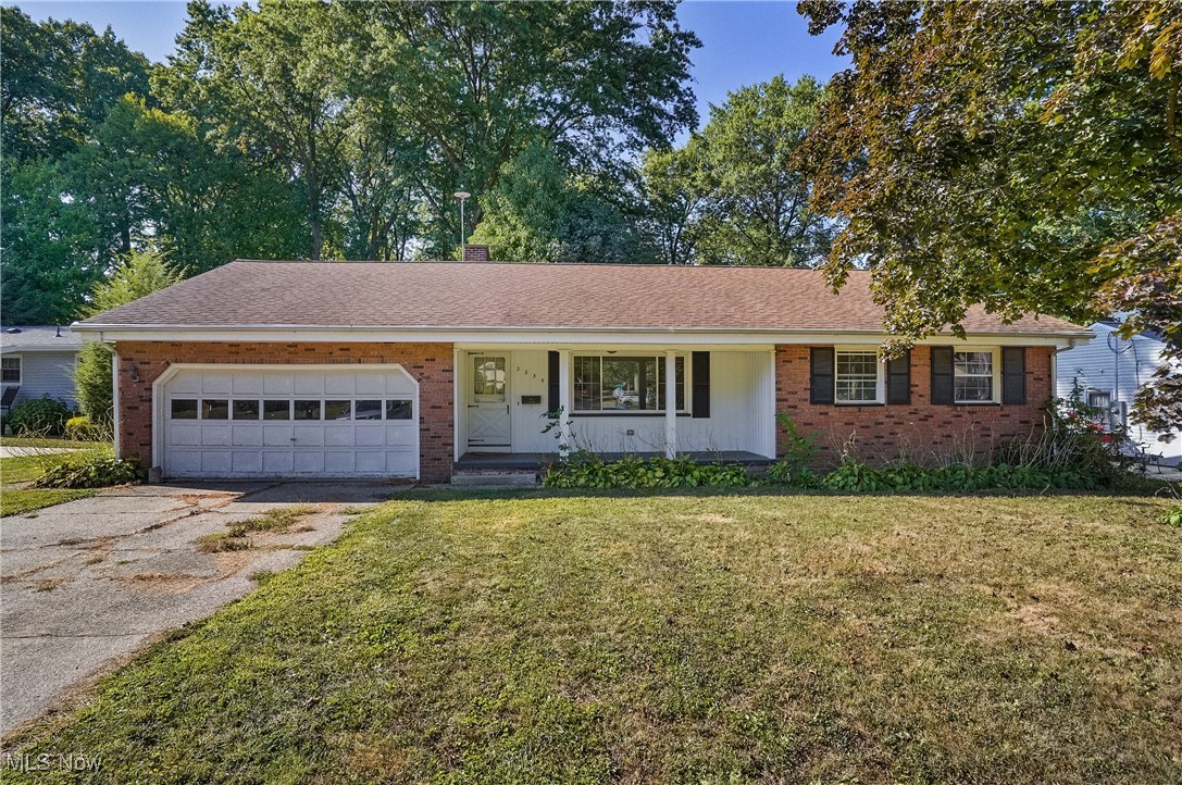 Welcome to this charming 3-bedroom, 1.5-bath ranch on Southeast Blvd! With over 1,500 sq ft of living space, this home offers a warm and inviting layout featuring hardwood floors throughout, with tile in the kitchen and baths. A spacious family room with fireplace creates the perfect gathering spot, while the eat-in kitchen showcases beautiful imported marble flooring. The basement is partially finished, providing additional living space, a dedicated workshop area, and the peace of mind of professional waterproofing. New furnace installed in 2022. Outside, enjoy a large yard perfect for outdoor entertaining or relaxation. Additional highlights include central air, a 2-car attached garage, and a desirable location within the Salem City School District. This well-maintained home combines comfort, functionality, and timeless appeal—ready for its next owner to make it their own!