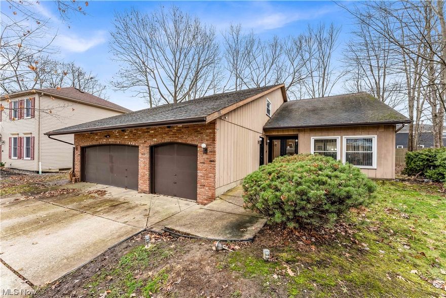 You are going to fall in love with this gorgeous home in Strongsville! Step up to the striking black double doors that lead into the beautiful open foyer with high ceilings and a grand staircase! Off of the foyer is the spacious living room! The living room features large picture windows overlooking the front yard allowing for tons of natural light! With plush carpeting, you are lead into the open dining area with plenty of room for seating making it the perfect space to gather and entertaining! Continue through to the incredibly spacious eat-in kitchen featuring tons of counterspace, cabinets that wrap around the room and a lovely double sink! Off of the kitchen you will find an additional room featuring a gorgeous brick fireplace with mantel, exposed beams across the ceiling and sliding glass doors that lead out to the large backyard! The first-floor half bathroom has wrap around counters and gorgeous flooring! You will also find an additional room that can be used as an office, bedroom or extra living space! Upstairs you will find 4 incredibly spacious bedrooms! The master bedroom has tons of closet space and is complete with a private full bathroom featuring double vanity sinks and a standing shower! The 2nd full bathroom also offers a double sink and a shower/tub combination! The convenient 2nd floor laundry room features a sink, counterspace and plenty of cabinets for storage! Outside you will find an incredibly spacious backyard with a deck that leads off the back of the home! There is cental air and an attached 3-car garage! With easy access to highways this is near food, shopping and tons of public amenities! This won't last long! Schedule a showing to see it for yourself!