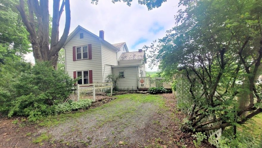 Stewart Real Estate Auction ~ Monday June 17, 2024 @ 6:00 PM Investment Opportunity ~ Consisting of a 1734 sq. ft. home with 3 bedrooms and 1.5 baths.  The first floor consists of an eat in kitchen with a spot for a pellet stove. The full bath with half bath attached.  A dining room and living room.  The second floor has 3 bedrooms.  There is a partial basement that is partially concreted.  The home has an enclosed front porch and a 2 level rear deck.  There is a 30’ x 42’ garage with a 24’ x 8’ addition.  This all sits on a double corner lot with privacy hedges.  The septic system is unknown and will need to be replaced by the buyer. This property is being sold AS IS.  The home is in need of updating and remodeling and the garage needs some roof work.