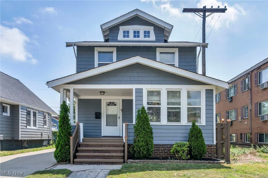 This nicely updated home is located just steps from Cleveland's vibrant West Park neighborhood, the shops and restaurants of the popular Kamm's Corner hotspot, and a short commute to Downtown Cleveland. The home features hardwood floors throughout, 3 bedrooms and 2 updated full baths, covered front and back porches, and a balcony off the primary bedroom. The living room opens to a sun-filled front sitting room that could be used as a first-floor office, and a formal dining room features a built-in corner cabinet. An updated kitchen includes all appliances and has access to the back porch. A full basement offers ample additional space, and a 2-car detached garage completes the tour. Some of the recent updates include: replaced A/C, replaced hot water tank, remodeled kitchen and 2nd-floor bath, replaced dishwasher and stove, finished/updated basement bath, replaced attic windows, refinished hardwood floors, replaced siding on portions of garage, replaced siding on first floor exterior of house, painted whole house exterior, replaced floorboards and rails on front porch, rebuilt back porch and balcony, built wood fence in backyard, replaced 3 storm doors, steel doors in kitchen to back porch and primary bedroom to balcony, installed LED lighting in basement, and more. INCLUDED are ALL kitchen appliances and washer/dryer.