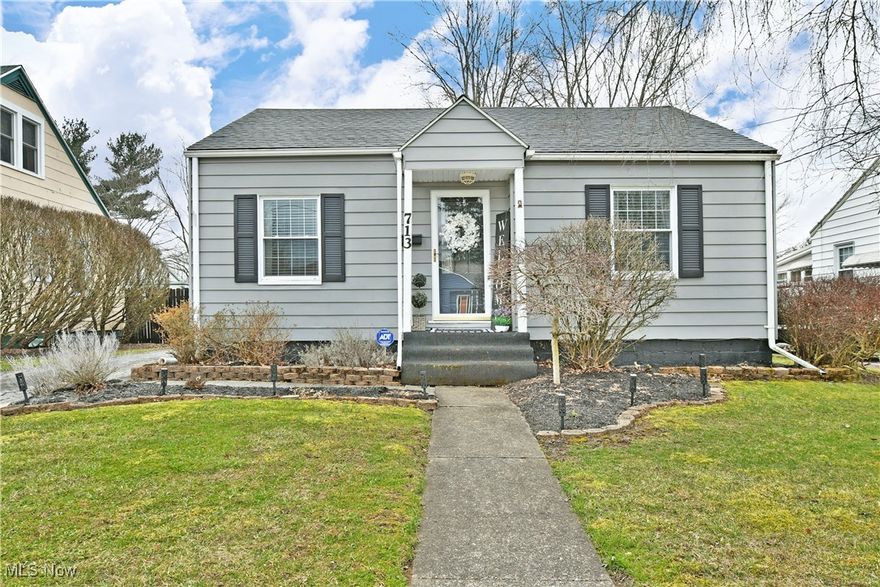 “You’re like, really pretty”, even the walls know the score as you get ready for the cuteness overload of this darling Warren residence! Set in a unique, early neighborhood close to attractions like the Packard Museum and Music Hall, this home will hold you in the heart of it all. The handsome exterior is finished in a lovely gray and white theme as manicured landscaping helps to set things off. Upping the ante further, a fenced-in backyard brings a relaxing raised rear deck, storage shed and above ground pool for upcoming warm summer days. Step inside to immediately fall in love with its updates and charm as tasteful improvements line the renovation. Hardwood styled flooring graces the welcoming living room with its shimmering accent wall and wrapping panel work. Tall windows allow for plenty of natural light through their lattice lined panes. Around the corner, a short hall finds cubby storage while a stunning, combined kitchen and dining area serves up visual delight. Bespoke lighting sits above as you enjoy a meal while marbled tilework runs underfoot. The custom cabinetry and stainless appliances are divided by a sleek backsplash. Down the main hall, a charm-packed full bath joins the pair of must-see bedrooms and their bright, inviting quarters. But that’s not all, a finished basement brings easy rec space, a second full bath, walk-in-closet and laundry services.