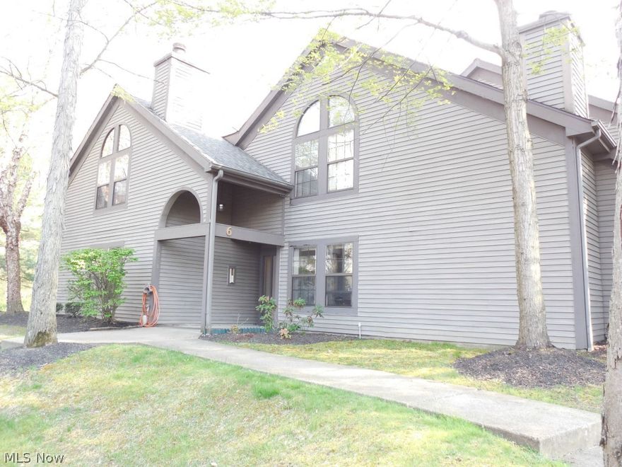 Unit on second floor, vaulted ceilings in great room, dining room, and 2nd bedroom.  Great room has fireplace and wood deck off of it that faces the woods. New laminate floors in foyer, dining room, and great room. Master bedroom with new carpet and walk-in master closet and full bath with garden tub. 2 full baths with new linoleum floors. Kitchen is equip with all appliances. Nice size bedroom 2 with double closet. Freshly painted.  Ready to move in. All appliances stay including the washer and dryer. New 3 dimensional roof and 4 new skylights! Tennis courts, Bocce courts, pool, and clubhouse.