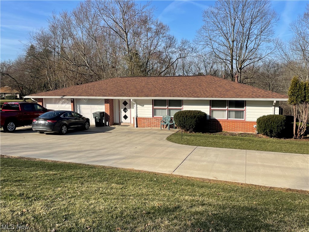 This is an amazing opportunity to own a (4) bedroom, (3) Bathroom, (4) car garage, brick home, with acreage, in the award winning Wadsworth School District, at an affordable price. This home has nothing but potential and unique features. This raised ranch sits on 1.9A and is connected to a second 4.6A buildable lot. The house offers a wrap around drive way with a lower level 2-car garage. The basement has it's own ingress/egress affording a possible in-law suite or rental income. The property is surrounded by a large yard that opens to the rear yard providing a panoramic and tranquil view of a wooded ravine, pond, and stream. The rear of the home is elevated and offers a wrap around deck providing an incredible view and vantage point of the wooded ravine below. Guaranteed to see wildlife nightly. The home has beautiful hard wood floors and walk in closets in bedroom #2 and #3. Large windows and plenty of natural light throughout the home. Generous room sizes and unique floor plan and features. Your children will love this home! This property is part of a probate estate sales and furnishings could be purchased at an extra $5K.