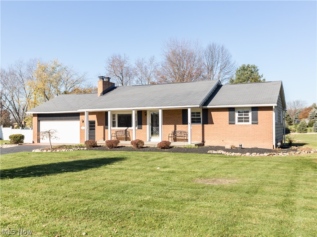 Sought after brick and vinyl ranch on a 1/2 acre lot! Nicely updated and neutral tones. Buy now and move right in! Gorgeous hardwood flooring throughout. Updated kitchen with stainless steel appliances. Very large recreation room in the lower level with full bath and stone fireplace. There is a second fireplace in the living room on the first floor. Great patio with fire circle. Washer and dryer stay!