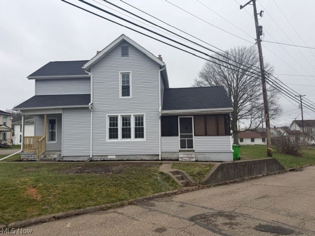 Photo of 525 E High Street, Uhrichsville, OH 44683 (MLS # 5195448)