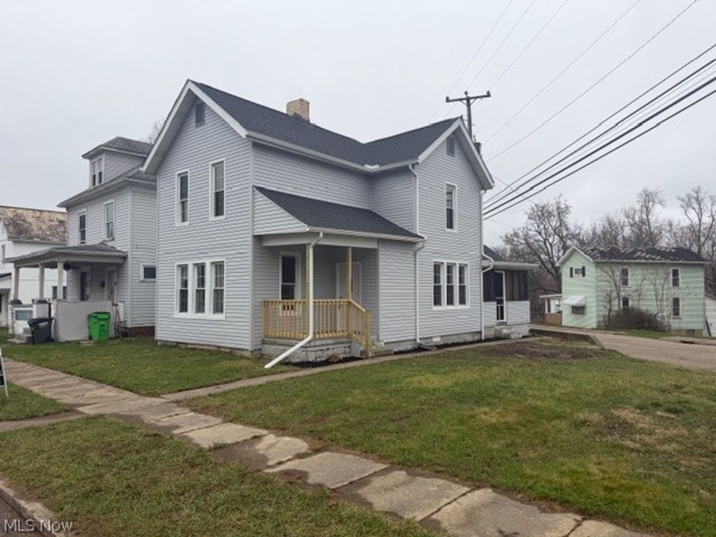 Photo of 525 E High Street, Uhrichsville, OH 44683 (MLS # 5195448)