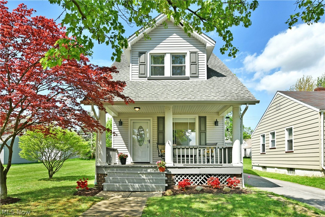 Picture perfect in every way, this gorgeous McDonald home is ready to welcome you home with two floors of beautifully presented living space! Lose yourself in the colorful rooms and thoughtful design choices that fill this expertly kept residence. Sat on a spacious double lot, the two-bedroom layout packs plenty of curb appeal with its relaxing covered front patio and manicured landscaping. Around the back, a secondary deck space overlooks the lush yard. Step inside to find the welcoming living room with its stained hardwood flooring and oversized picture window that fills the room with plenty of natural light. A must-see kitchen awaits nearby with its bold, blue cabinets and shimmering stone countertops that complement the stainless, bright work. Enjoy a casual meal along the far side of the room as you take it all in. Up the stylish staircase with its ornate runner work, the landing reveals a striking full bath hidden behind a barn style door. Masterful updates include a glass stall shower and elegant vanity. Each of the bedrooms exude grace and inviting quarters while including personal closet space. A full basement below provides laundry services and additional commode. Call today to make 438 Garfield your new home.