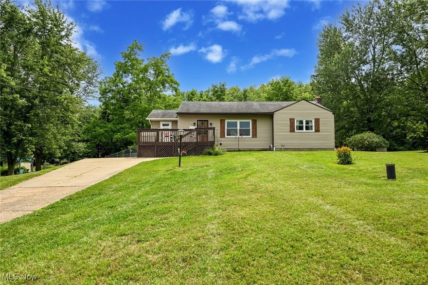 Dying to find an affordable home in the Green school district with land?  Your wishes have come true!  2150 Wise Rd gives you an amazing country setting in the most convenient location.  Nestled back on nearly 2 acres of gorgeous property, this is the perfect spot to raise a family, have a massive garden, tons of recreation space, build a pole barn or even a 2nd home!  Come on in & immediately fall in love w/ the open floor plan framed by an exposed wooden beam.  Amazing natural light, beautiful natural hardwood floors & the most charming country kitchen!  Plentiful white cabinets, luxury vinyl plank floors, ceiling fan, newer appliances, Mason jar light fixture & a wooden accent wall to finish it off.  Mudroom off the kitchen is lifesaver for muddy boots & pets.  It's also bonus storage & the sellers are leaving the extra refrigerator too!  The 3rd bedroom is small but so adorable w/ the custom Dutch door.  Perfect as a nursery, toddler room, play room or office.  Down the hall you'll find an oversized bathroom w/ a large walk-in shower & custom tile floor & walls.  There are 2 additional spacious bedrooms w/ ceiling fans & great storage.  Downstairs is an awesome rec/family room w/ a gas fireplace & sliding barn doors.  On the back side of the lower level is a fantastic opportunity area.  Walk-out, updated full second bathroom, work shop area & tons of storage.  With a little work, you can add more square footage & value to the home!  Head out back to the spot where all your friends & family will want to hang out.  This large patio is great for get togethers around the fire, gazing into the back woods & enjoying some peace & quiet.  The barn is ideal for animals, storing your ATVs & tractors or a man cave.  Don't miss that there are 2 parcels w/ this property.  The entire 2nd parcel to the right of the house is included!  New well pump, sump pump, windows & retaining wall.  Newer front door & barn roof just 1 year.  Don't miss your chance to make this one yours!