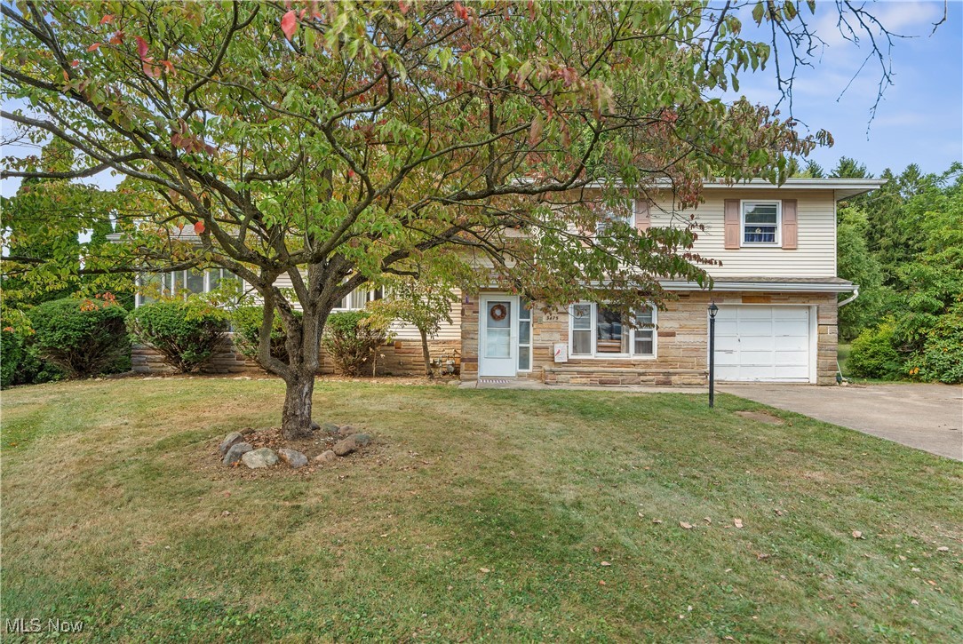 Love Where You Live! Welcome to this charming 3-bedroom, 2-bath split-level home in Lake Local Schools! Step inside to find beautiful hardwood floors, a spacious kitchen perfect for gatherings, and an updated bathroom that adds modern style.
The home offers an inviting sunroom that opens to a wrap-around deck, overlooking the large backyard—a perfect setting for entertaining or relaxing. The updated lower level provides flexible living space for a family room, home office, or playroom.
Move-in ready and ideally located near schools, shopping, and dining, this home has so much to offer. Don’t miss your opportunity—schedule your showing today!
