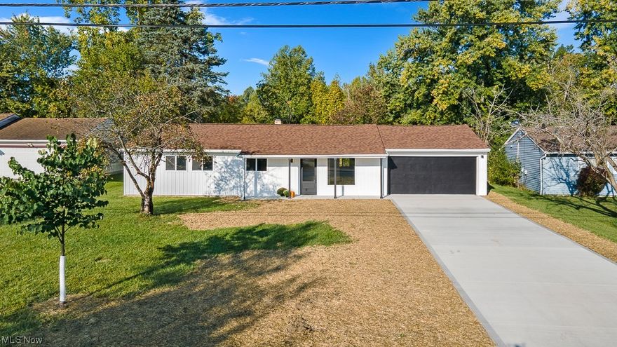 Completely transformed, SPACIOUS and super modern, this gorgeous home is ready for it's new owner. With attention to detail and beautiful finishings, this home will be your sanctuary and should require very low maintenance. Brand new kitchen and bathrooms, all new flooring, fixtures, siding, gutters and downspouts with proper drainage, and a private outdoor patio are included in the list of extensive updates. NEW windows, electrical panel and all new concrete driveway. The attention to detail extends to the garage with new lined walls and ceiling, garage door, and opener.