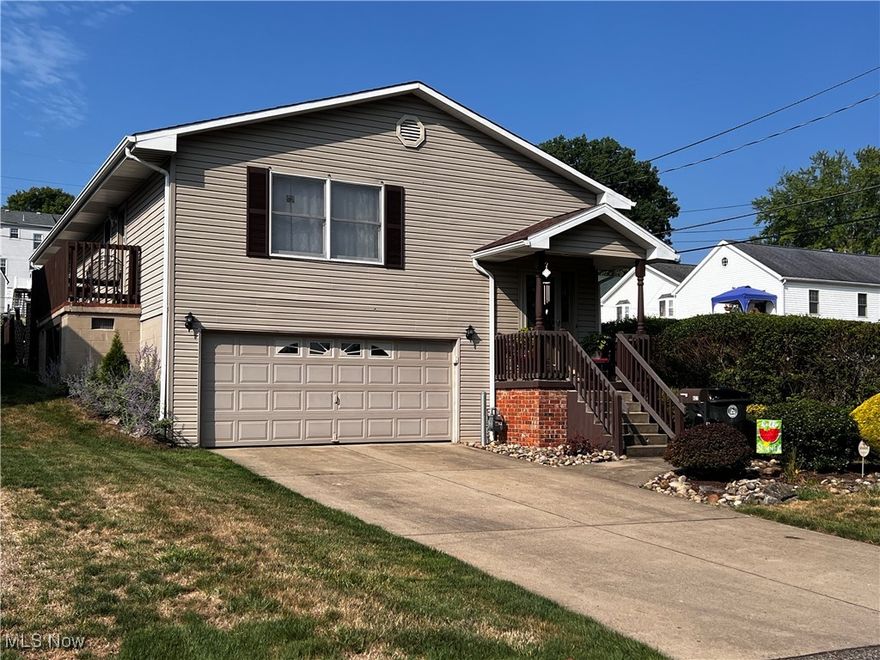 Welcome home to this 4 bedroom 2 bath Beauty built in 1991.  Upon entering you will notice the warm welcoming entry way which leads up to the dining room adorned by a unique chic chandelier.  This space opens to the living room which shares a gorgeous butcherblock breakfast bar with the kitchen.  Perfect for keeping everyone included with its thoughtful set up.  The kitchen features new granite countertops, farmhouse sink, dishwasher, stove and refrigerator. Back the hallway you will find 3 of the 4 bedrooms and a full bath (tub/shower) illuminated by a skylight.  The main bedroom features a large walk-in closet. The additional bedrooms feature double closets. On the lower level you have a spacious family/great room with built in cabinets and gas fireplace.  Here you will also find plenty of closet space for storage that continues under the steps as well. Use Bedroom 4 for guests or as a main-The choice is yours. You are only a few steps away from another full bath with a shower. Laundry Room is conveniently located here as well. Heading outside you will find more storage under the side deck. Relax and enjoy company on the newly resurfaced composite back deck that overlooks a peaceful fenced in backyard.  There is a bonus room accessed from this area as well through sliding glass doors.  You must know this home does appear smaller from the road then it truly is.  I love the light and airy feel throughout that color hues whisper "Relax you are Home".