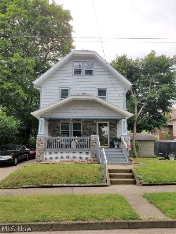 Welcome to 958 Wall St. This charming home has a ton of updates and preserved old world charm. Brick fireplace and built in cabinets greet you when you step in the front door. Dining room also boasts built in cabinets with beveled glass doors between the living room and dining room. Beautiful remodeled kitchen with all new appliances in 2010 and an addition on the back for a larger feel in the kitchen. Great back deck right off the kitchen. Tons of storage in the remodeled bathroom. 3 bedrooms on the 2nd floor with 2nd floor laundry off of the master bedroom. Staircase to 3rd floor comes off the hallway and leads to the 4th bedroom and an additional room which serve as the 5th bedroom. Roof, siding, furnace and central air all new in 2015. Don't miss out. Call TODAY to schedule your private tour.
