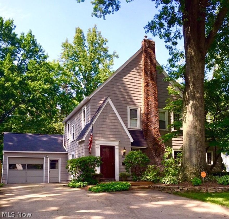Beautiful 3 BR colonial filled with functional & stylish updates in amazing West Akron location steps from Starbucks, 750 mL and West Side Bakery!  Owners have tastefully and lovingly updated this 1833 sqft home with a new en suite master bath (2011), exterior paint (2013), back brick patio ( 2012), dining room hardwood floors (2011), and updated second full bath (2011), tuckpointed chimney & foundation (2011), roof & attic insulation (2007) - to name just a few.  Large and open great room with hardwood floors and cozy fireplace w wood mantle.  Spacious playroom/office off of great room with built-in shelves and french doors.  Dining room features charming coffered ceiling, hardwood floors, and is open to sitting/bar area with slider to amazing brick back patio - a wonderful layout for entertaining.  Kitchen with granite countertops, tile backsplash, stainless steel appliances, tile floor w inlay and spacious eat-in area with door to back patio.  Half bath off of kitchen.  Large master