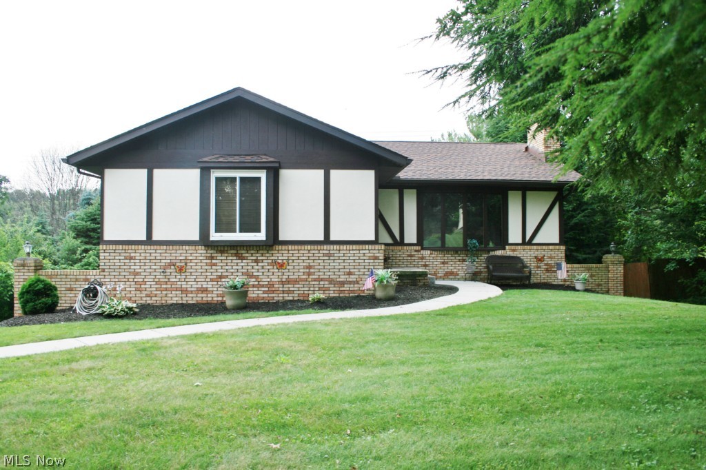 What a find in Green Local Schools! One owner for last 40 years, exceptionally clean & move in ready. Home boasts 3 bedrooms each with own walk in closet! Living room and kitchen with vaulted ceilings. 2 full baths, one on finished lower level with walk out basement adding 500+ square feet to living space. Basement walks out to screened in patio 15x12. Tons of closet space! New water softner, well tank, hot water tank, HVAC in last 3 years. 30 year shingles about 8 years ago. All big ticket items taken care of. Seller also willing to leave all appliances and most of the furniture! Seller offering one year home warranty! Call listing agent for details.