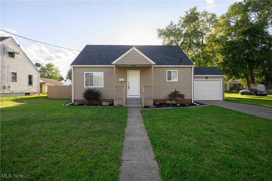 Don’t pass up this incredible bungalow home! This home is better than new. Completely redone from top to bottom. Starting with the exterior, new vinyl siding, garage door, windows, roof, spouting, new spigots on the side and rear of home, front door and locks, ring doorbell camera and landscaping. Now for the interior. All new kitchen. Cabinets, countertops, Samsung smart microwave range cooktop, sink and faucet, lighting, and flooring all throughout the home. Bathroom completely remodeled as well. Tub/bath combo, sink, vanity, mirrors, lighting, commode, and plumbing. New furnace/AC, hot water tank, electrical panel, utility tub, water meter and plumbing. There is still so much more to this three bedroom one bath, bungalow home. Upper level can accommodate a den, exercise room, or even another bedroom, your choice! Move in ready.