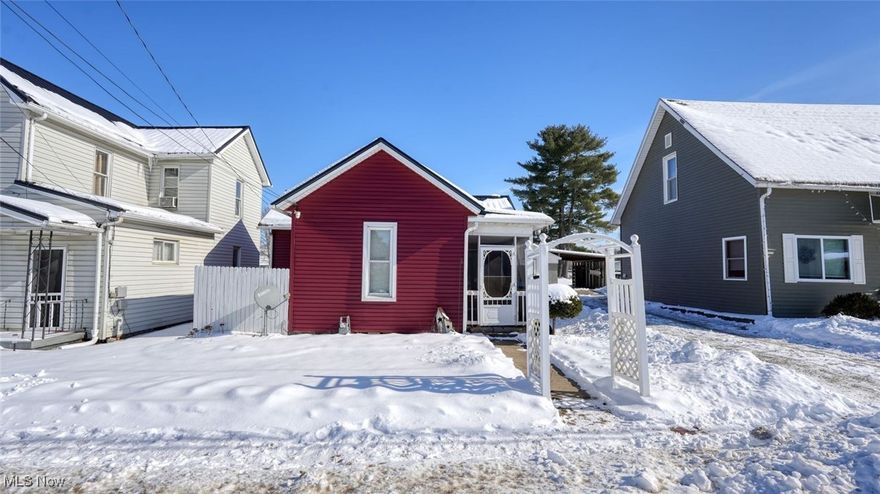Welcome to this charming 2-bedroom cottage with recent improvements and thoughtful outdoor living space. This home features a new roof and updated siding within the past three years, offering long-term durability and low exterior maintenance. Step inside and enjoy the screened-in front porch, perfect for relaxing in comfort, or head out back to the fenced patio area that creates a private space for outdoor dining and entertaining. The property includes off-street parking in the rear, adding convenience in a central location. Public utilities are connected for water and sewer. Situated near schools, shopping and dining, this property presents a comfortable blend of character and upgrades. Schedule your showing today.