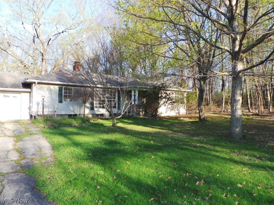 Spacious Ranch with tons of charm.  Close to everything!  Two fireplaces, walk out basement.  Large wooded backyard.  Lots of potential here!  Property is HUD owned and sold AS IS.