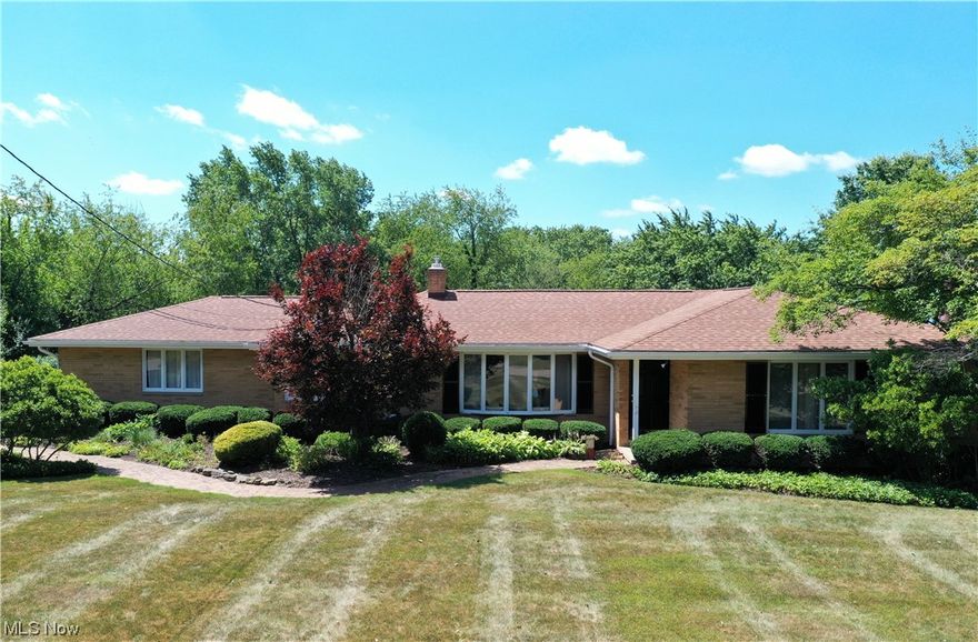 You will love this charming, brick ranch with a .78-acre lot on a dead-end street. This well-maintained four-bedroom, three-bath, home offers over 2,900 Sq Ft of living space. Welcomed by the great room with a large bay window and an abundance of natural light. The bright formal dining room is open to the spacious great room. The kitchen offers a peninsula, a tile backsplash, ample cabinet space, and a picturesque view of the backyard. Finishing off the main level are 4 large bedrooms, one featuring a beautiful fireplace, and 2 full baths. The master suite has 2 closets and a private master bath. The lower level has a walkout basement that offers over 1,200 sq ft of living space which includes a family room, an office, a recreational room with a fireplace, a full bath, access to the enclosed porch, and, a storage room. The porch features nostalgic pendant lights and is perfect for entertaining family and friends. The park-like backyard has a deck, a patio, and an attached shed, and ove