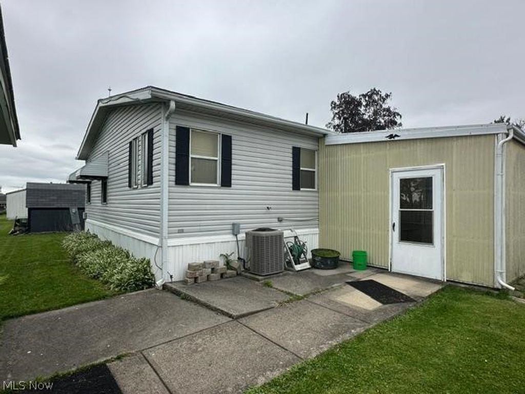 Photo of 711 Brookside Drive, Wellington, OH 44090 (MLS # 5212724)