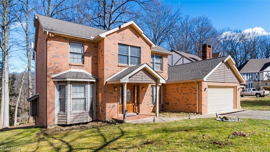 Welcome to this beautiful two-story brick home in the desirable Woodlands subdivision within the West Muskingum School District. Located on a quiet cul-de-sac, this home offers privacy while remaining minutes from shopping, dining, and hospitals. Inside, the open foyer with soaring ceilings and abundant natural light creates an inviting first impression. The open-concept layout is perfect for everyday living and entertaining. Upstairs features three bedrooms, including an owner’s suite with a private bath and walk-in closet. The walk-out lower level provides endless possibilities for additional living space. Enjoy peaceful outdoor living in a well-landscaped setting.