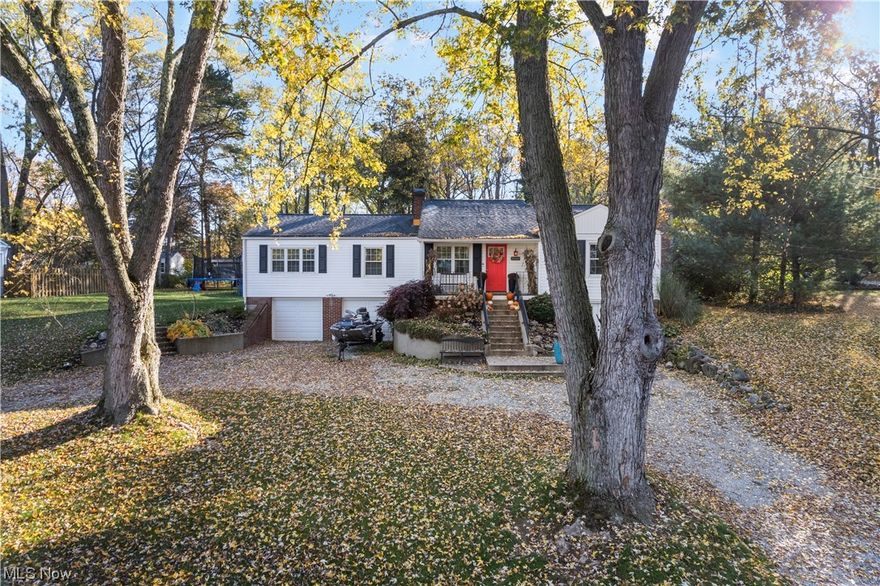 This immaculate 4-bedroom, 3-bathroom home in Lake Cable is exactly what you've been looking for. Thanks to an amazing addition, this sprawling ranch has been totally overhauled to feature vaulted ceilings and an open concept layout while still retaining that classic lake-home charm. The chef's grade kitchen features granite counters and an oversized island that's sure to become the centerpiece of the home. Newer cabinetry, stainless appliances, and a custom hood vent complete the look and function of the area. The living room, with its cozy fireplace and soaring ceilings, flows seamlessly into the dining and entry areas, creating an open and inviting atmosphere. To the north side of the home the Master Bedroom offers a generously sized retreat. A tastefully remodeled full bath and guest bedroom complete this section of the home. To the other side, we find two more guest beds, one currently acting as a first floor laundry room, and another full bath. and it doesn't stop there. Head downstairs to find the bar area walk-out rec room and bar area along with a remodeled half bath. To the back of the home, beneath the addition, you're greeted with a room offering endless possibilities. Originally designed to be a golf simulator, it features ten foot ceilings and is ready to be finished. The outdoor space is a landscaped paradise as well, complete with an expansive patio for gatherings and a private wooded lot that's sure to offer peace and quiet here in the heart of Lake Cable.