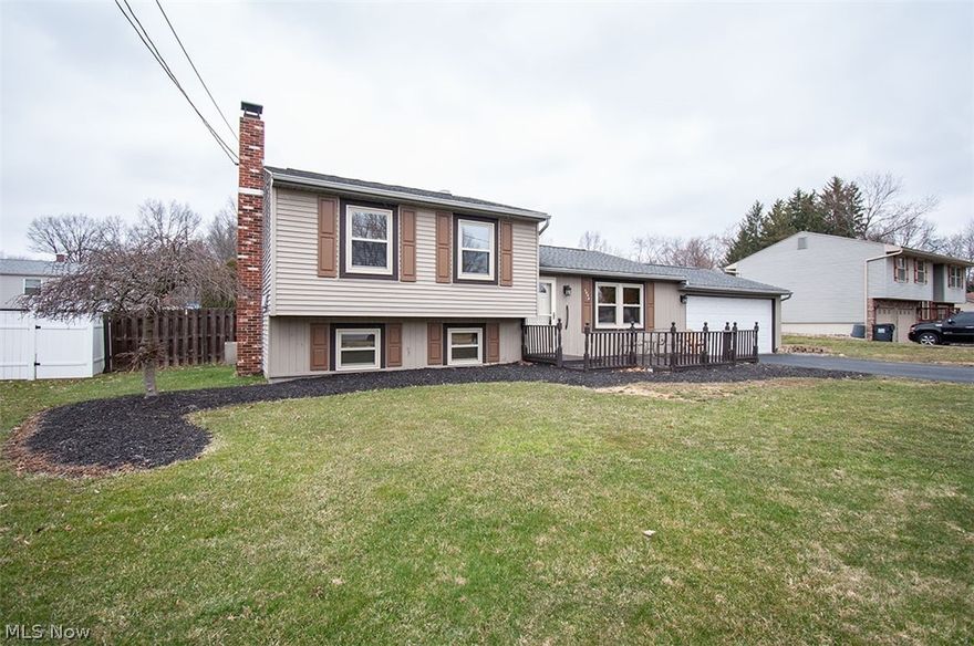 MOVE RIGHT IN to this updated four bedroom home! Notice the large front patio to enjoy the well kept neighborhood. Walk in to the main level with a large living space and dining room while having the convenience of a fully updated kitchen with granite counters, beautiful skylight and all stainless appliances staying! The lower level showcases a family room with maintenance free flooring and a full bath with elegant wood work, tile flooring and a jetted tub. The upper floor is host to another full bath and all four bedrooms. The largest of the four is hard to miss with all of the stunning and unique wood working unlike anything else in the neighborhood. This room can flex as another entertainment space as it has full access to the back yard through a large sliding glass door. Moving out back you will notice a fully fenced in yard with a covered patio near your above ground pool perfect for hot summer days. The back is complete with a storage shed and a workshop area with many possible uses. Newer roof, furnace and water heater round out the home and throw in a ONE YEAR HOME WARRANTY for good measure.