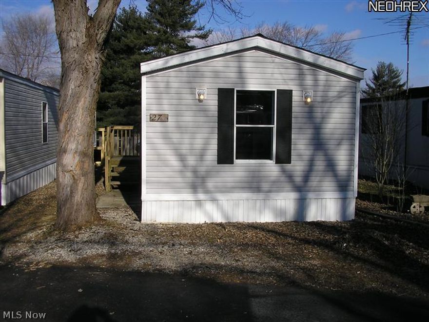 3 bedrooms, 2 baths. Home has had extensive updates. Roof 2013. New kitchen cabinets, counter top, floor, lights. Bedrooms, new carpet, lights, freshly painted. Area for laundry room. Lot rent is $235/month, includes water, sewer,trash pick up. $50 non-refundable application fee. Buyer must be approved by park manager. Seller is offering short term land contract. Free lot rent through September for any approved contract and application. Call for terms and conditions.