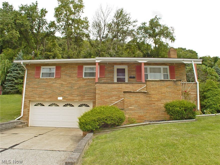 Buyer receives a free home warranty upon purchase of this 3 bedroom brick ranch on 2 beautifully landscaped, fenced in lots on a quiet street. This is a must see! Finished rec room with fireplace and bath in basement. Covered rear porch.