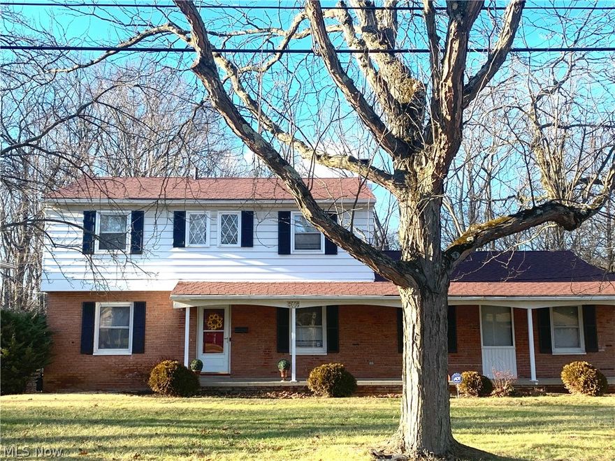 This expansive colonial offers 4 beds and 2.5 baths, a welcoming foyer, two roomy living areas, an eat-in kitchen, formal dining room, newly renovated en suite master bath, storage galore with large closets, built-ins, and bonus storage areas on first floor and in partially finished basement. Sprawling front portico and serene wooded backyard with deck for relaxing and entertaining. Rear-facing attached 2-car garage. Minutes from parks, schools, Wallhaven shopping + dining/new Whole Foods plaza. New roof 2016. New furnace installed October '19. One-year warranty included.