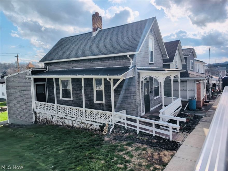 Look at this Prime Opportunity in the Heart of Dennison.  Is this the home you have been waiting to purchase?
With a little ambition and a few updates, it can be perfect and the Price is Right!  But wait... Look at the updates already done. A brand-new beautiful bathroom installed in 2024 with walk in shower.  Furnace is only 3 yrs. old, A/C about 10 yrs. old, Roof 2008, gutters and soffit in 2010, windows, doors and updated electrical box about 15 yrs. old. This home has a beautiful large kitchen with an island, nice ample cabinetry with lots of light. The large adjoining dining room offers lots of space for an office or playroom. A welcoming spacious living room and 2 large bedrooms in the upper level. The full walk out basement offers additional space for storage and a large room for family fun. Enjoy relaxing on the large covered front porch.  It is perfectly positioned just a short stroll from downtown. With a few updates, this could be the perfect first home or a high-demand rental.   Opportunities like this don't last.  The Home Sells as-is.   It is ready for your vision and enjoyment or great opportunity to turn a renovation project into future cash flow! Living room fireplace is non-working and has been closed off.