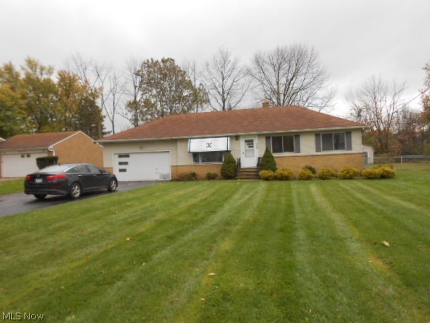 Classic ranch with hip roof design priced to sell!  Over-sized attached two car garage.  Extra wide drive.  Low maintenance vinyl sided exterior.  Deck off the rear overlooking the large back yard.  Eat-in kitchen with ample cabinet space.  Full, partially finished basement with paneled rec room.  Tons of potential at this price!