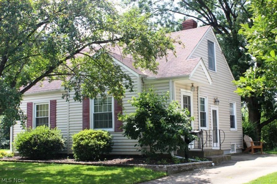 A pleasure to show this 3 bedroom cape cod in the heart of Firestone Park* Pretty neutral décor throughout & numerous updates including but not limited to replacement windows including glass block, vinyl siding, bathroom & more* Spacious eat in kitchen with oak cabinets, pantry, gas range, refrig. & newer disposal* 1st floor master with wood floor* Bedroom with walk in closet* Updated bath with ceramic floor* Wood floor under carpet* 6 panel doors* Central air, humidifier, washer & dryer* Utility shed* 1.5 car detached garage with opener* Pretty treed lot* Warranty provided* Just move in*