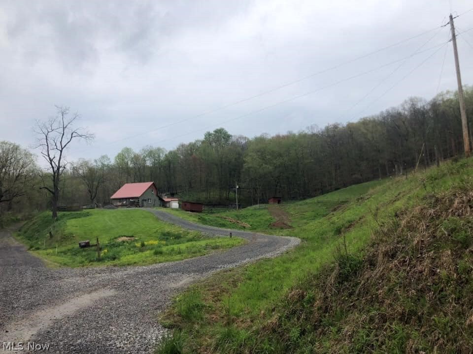 Wow! This 11.2 Acre Small Hobby Farm is beautiful with so much going for it
In Doddridge County tucked away at the end of a hollow sits this small piece of paradise.
The home offers 3 bedrooms, 1.5 bathrooms, Eat-in-Kitchen, Living Room, Entrance Foyer and Laundry Area.
You can cast a line in the pond or hunt the hills for WV Wildlife.
The land is breathtaking and this is a must see.
Free Gas (APO)