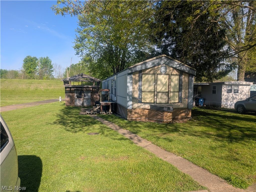 Photo of 460 1st Street, Brewster, OH 44613 (MLS # 5210241)