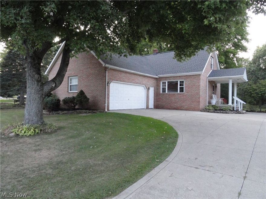 Charming Tallmadge Cape sitting on 1 acre adjacent to Maca Park!  Spacious eat-in kitchen with beautiful oak cabinets, newer stainless appliances, tile floor and sliders to overlook the expansive acre lot.  Living room opens to kitchen plus has big picture window welcoming the sun light.  2 bedrooms on main level with updated 1/2 bath.  2 bedrooms on 2nd level which includes a full guest bath and a fabulous master suite with a temperature controlled gas fireplace, skylights and a glamour master bath with jetted tub, dual sinks and separate shower.  Lower level with two finished rooms plus unfinished side for laundry & storage. Roof replaced in 2012. Oversized custom shed. This home has been owned and lovingly maintained by the same family for over 30 years.