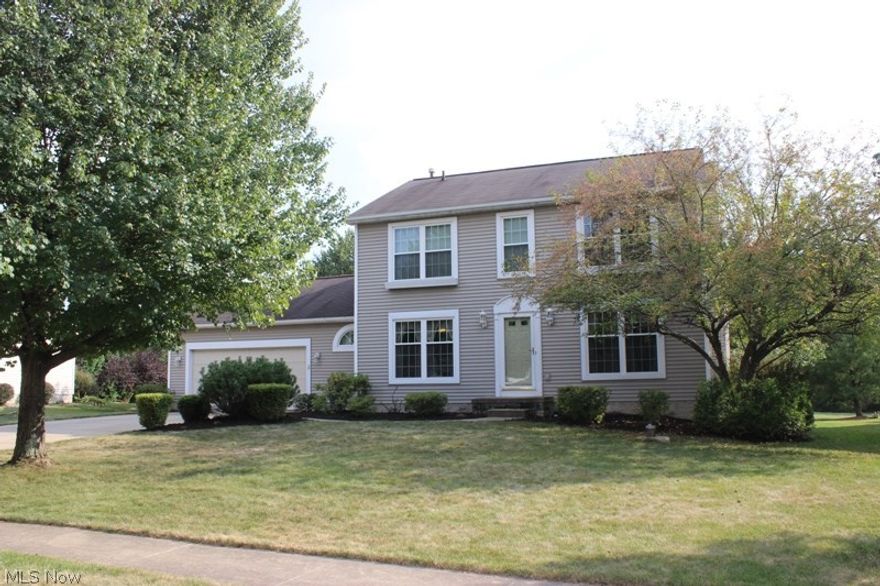 Wonderfully updated 4 bedroom home in the Pebblebrook Allotment of Plain Township is a rare find! Enjoy the almost 3/4 acre treed park-like setting that even comes with it's own tennis court, and a secluded wooded back area with a little creek too. Enjoy all the great updates that include new windows, central air, lighting, and flooring. The chef will certainly appreciate the new granite countertops, stainless appliances, center island, backsplash and sink. Master bedroom boasts two walk-in closets, garden tub, shower and ceramic tile flooring. Second bedroom also has walk-in closet. 4th bedroom in lower level  could easily be used as an  office or bonus room. Spacious Recreation Room  makes a great play area too. New deck with vinyl railings overlooks the wonderful backyard. Tennis court also makes a perfect spot to roller blade, bike ride, or play basketball.  Get this quick! It's move-in ready.