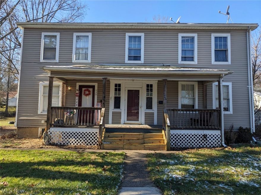 Investors don't miss this ideal two unit in Kent licensed for 9 and used as two four bedroom units. Kent City inspection passed this summer. Separate utilities in each unit and most systems have been improved or replaced in recent years including electrical panels in each unit and additional wiring, gas furnaces replaced and water heaters replaced in the past two years. One unit is tenant occupied, the other is vacant with recent repairs being made including top to bottom soil pipe replacement. There's plenty of room for parking in the 62' by 169' lot and a three bay garage in back may be usable with some repairs. Good rental history and great location close to KSU and Kent downtown.