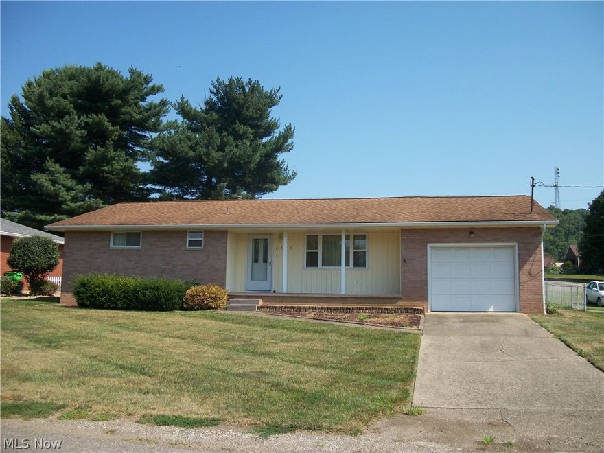 JUST A CHARMING BRICK RANCH WITH GREAT STREET APPEAL. This sand-brick ranch has been shown a lot of love over the years. Situated on an expansive corner lot with chain-linked fenced-in back yard and large storage building. Front porch leads to spacious living room, 3 bedrooms with master bedroom equipped with 1/2 bath. Kitchen with appliance package and eat-in breakfast bar with formal dining room with glass-sliders leading to a 13.5 X 11 screened-in back porch. 1 car garage leads to a large family/rec room downstairs great for hosting family events. Full partially finished basement with the major mechanics updated in the last 10 years. This home is ready for your personal touch. Just a nice home, inside and out!