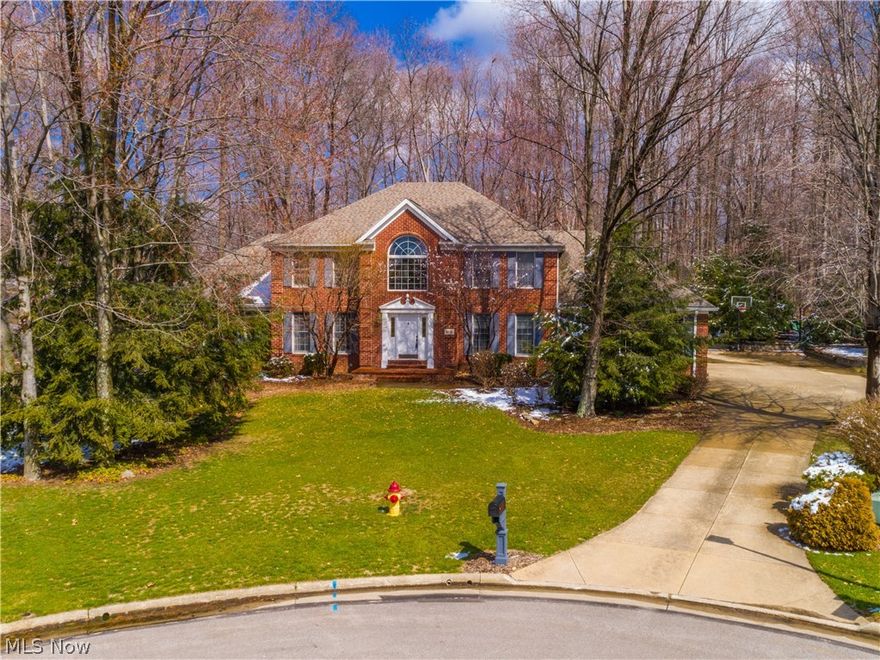 Location, Location on private .75 acre cul de sac lot in Mayfair Estates* Wonderful custom built 4 bedroom/3 bath colonial with 3153 square feet, plus 3 season sun room, 3 car side load garage & full unfinished basement* 2 story foyer with wood floor, plant ledge, palladium window & stair case accessed from foyer & kitchen* Living room/sitting room* Formal dining room,w/tray ceiling & crown molding* Step down great room with built ins each side of brick gas log FRPL, speakers & double Anderson slider to 10x22 3 season sun room with skylight & wrapped with windows/sliding doors* Spacious eat in kitchen with island/breakfast bar, pantry, corian, jenn air gas burner top, double over, newer microwave & refrigerator, roll out shelves, ceramic floor & access door to sun room* 1st floor den with wainscoting, wall of built ins/work area* 1st floor full bath (beside den)* 1st floor laundry with cabinets, shelves & utility sink* 2nd level master bedroom suite having atrium door to balcony, walk