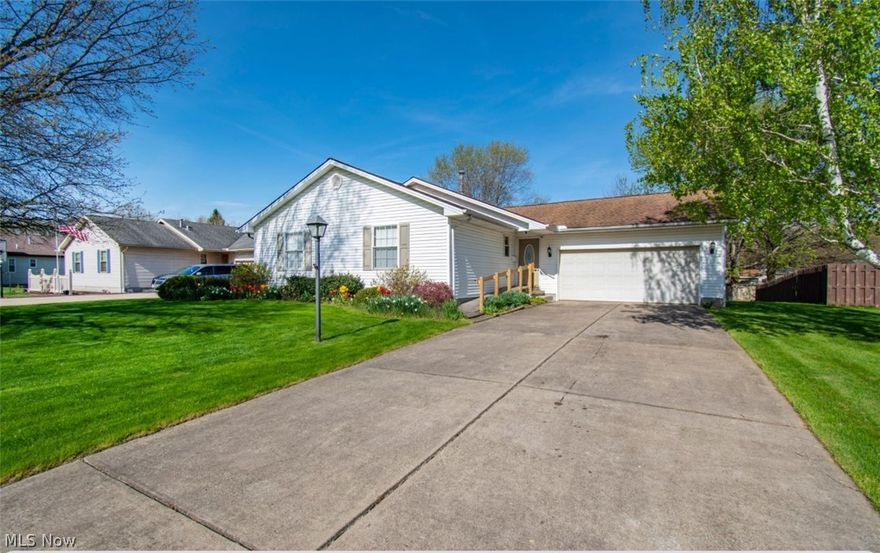 Discover the ultimate in one-floor living with this spacious ranch-style home in Mineral Ridge. Boasting a large living area, kitchen with granite countertops and abundant storage, three generous bedrooms, and two full bathrooms one of them offers a walk in shower, this property has it all. Full basement provides ample space for storage. Enjoy the stunning enclosed back porch and expansive backyard, perfect for outdoor entertaining. Additional features include a newer roof, newer furnace, and newer hot water tank, as well as an attached two-car garage. For added convenience, a handicap wheelchair ramp is also included. Don't miss out on this incredible opportunity and the perfect blend of style and functionality - call and schedule your showing today!