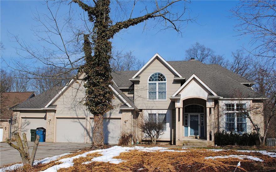 Wonderful Colonial home on a private cul-de-sac street is certain to impress.  90X390 lot backs up to woods offering beautiful views year round. 2 story foyer to greet your guests.  1st floor office with built in bookshelves.  Formal dining room.  Large, eat in kitchen with island, granite counters and walk in pantry.  Warm family room with woodburning fireplace.  Split staircase to 2nd floor.  Spacious primary bedroom offers vaulted ceiling, walk in closet and glamour bath with double vanity, stand up shower and jacuzzi tub.  All bedrooms with good size closets.  1st floor laundry room.  4 full baths... 2 upstairs, 1 on the main floor and 1 in the basement.  Huge, partially finished basement already has drywall... could easily be finished with carpet and paint... and includes walk out to backyard.  Oversized 3 car garage with pull down stairs to attic storage.  Great location close to schools, recreation and downtown Amherst.  You've found it!  Call agent today.